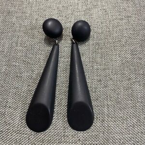 Black metal dangle pierced earrings.  Approximately 4” long.